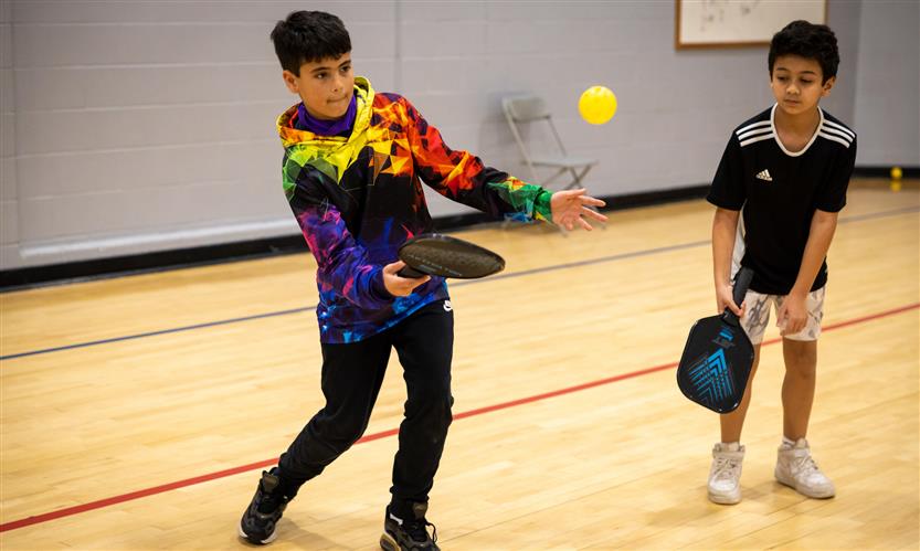 Students play in PE class
